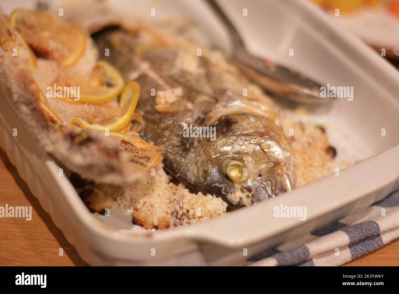 Baked trout in salt crust. The crust is removed from the fish Stock