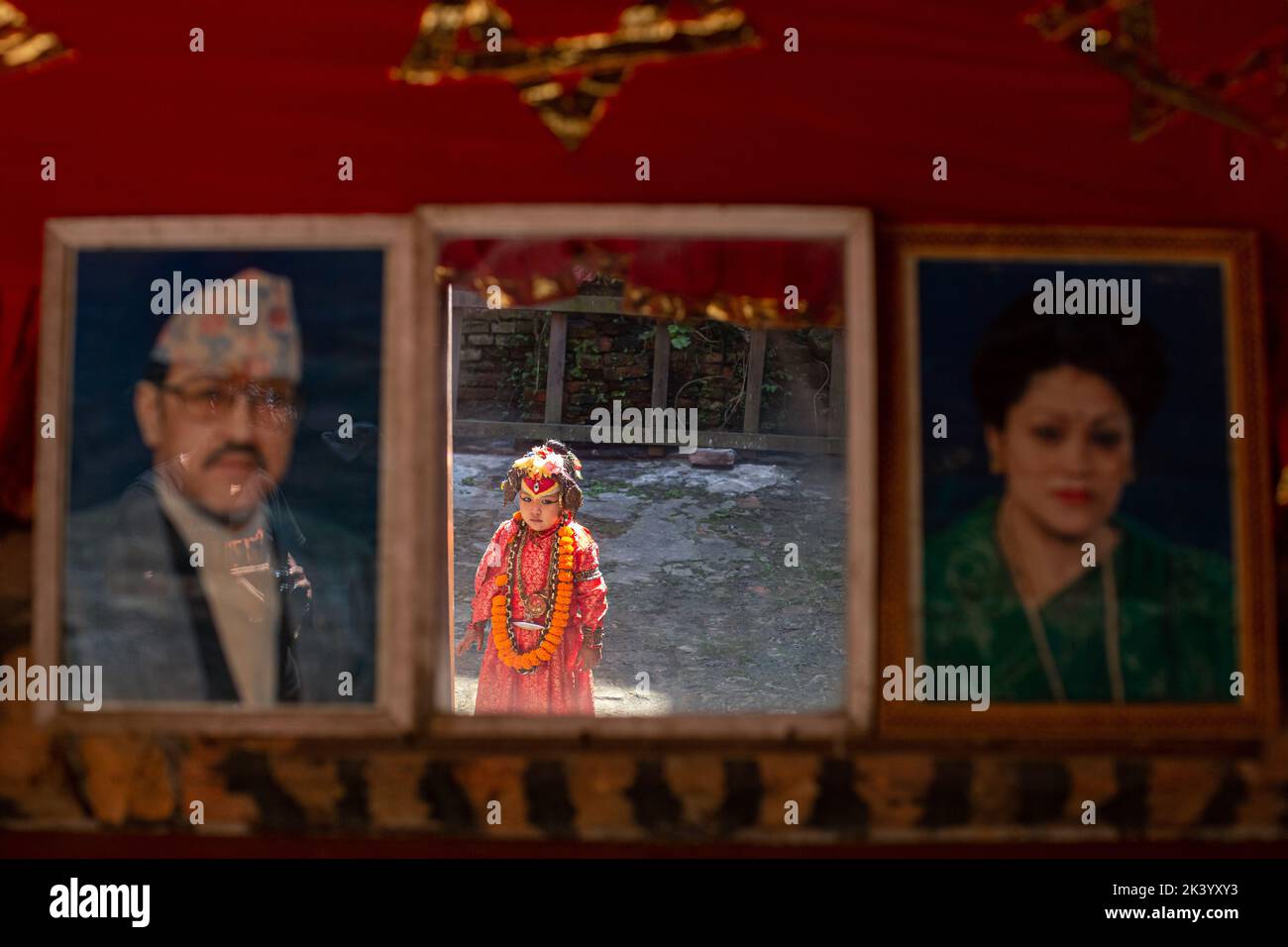 Nepal. 29th Sep, 2022. Living Goddess Kumari Of Bhaktapur is pictured against mirror in between