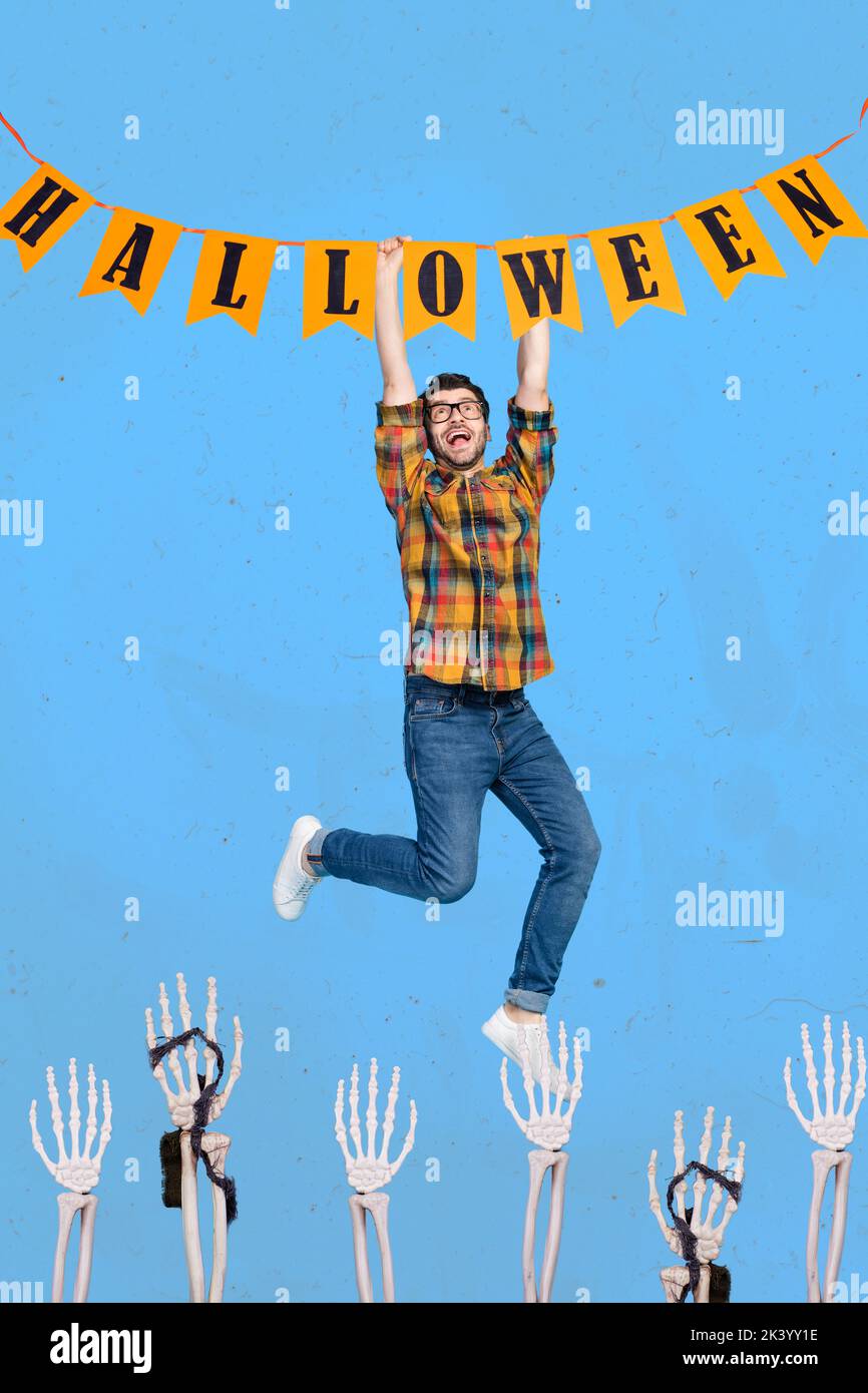 Composite collage picture image of funky frightened young man hanging halloween decoration flags garland escape skeleton hands zombies Stock Photo