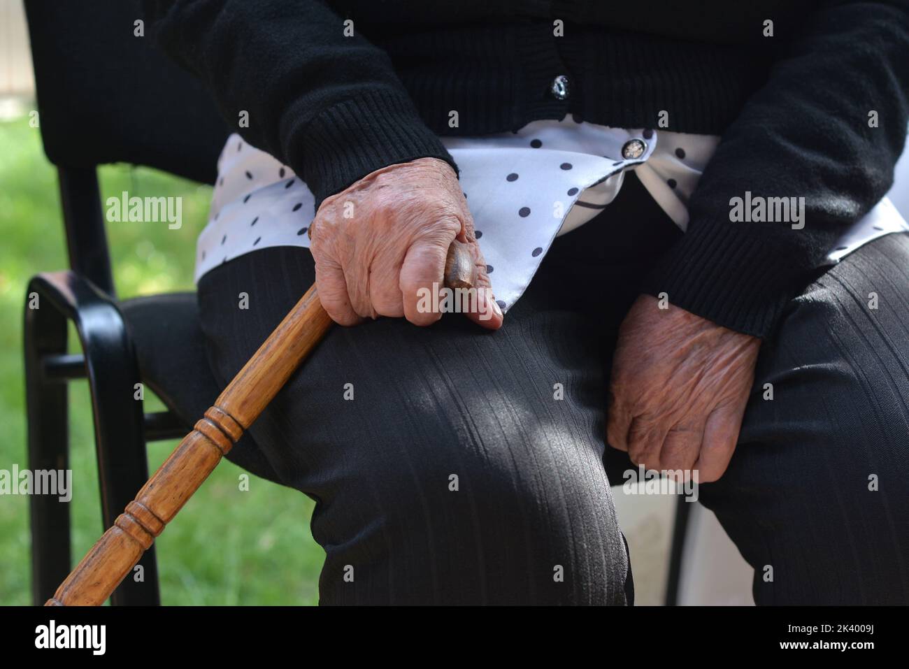 Old man with a walking stick hi-res stock photography and images - Alamy