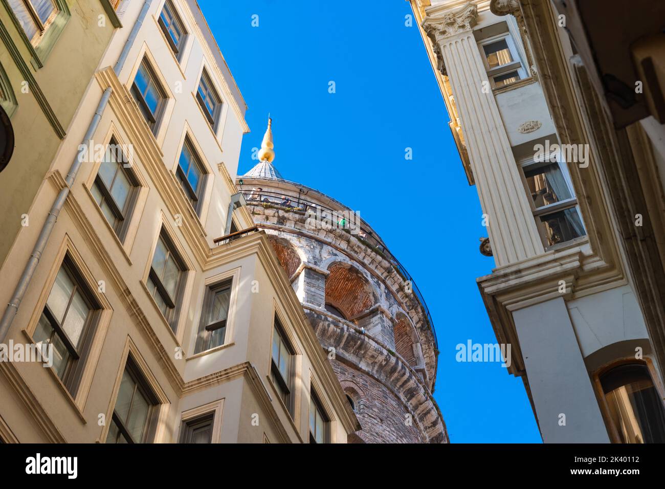 Galata Tower view from below. Travel to Istanbul background photo. Historical places or landmarks of Istanbul. Stock Photo