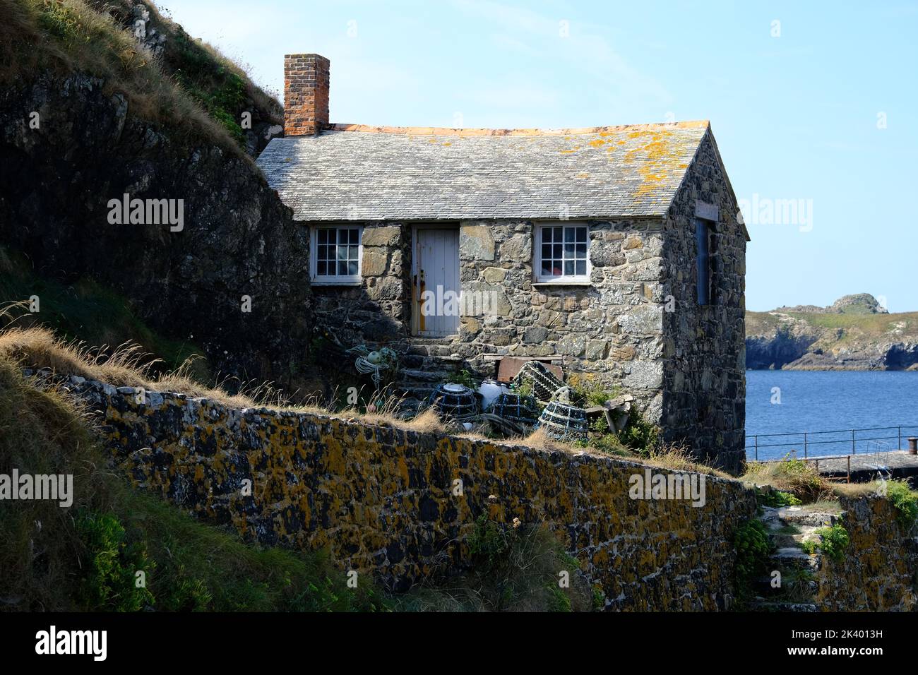 Historic fishing hut by the side of Mullion Harbour in Cornwall Stock