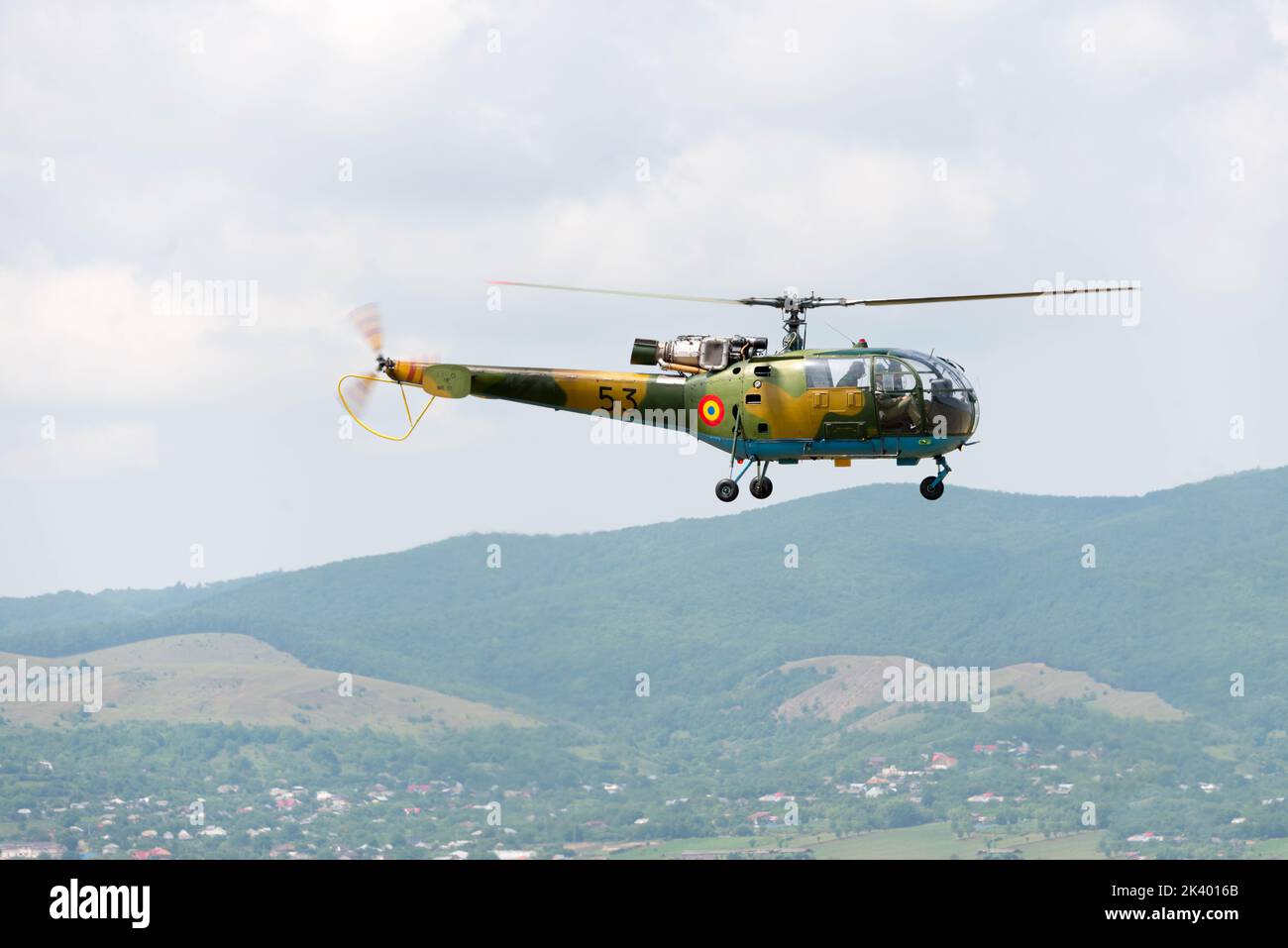 Helicopter flying in mid hi-res stock photography and images - Alamy