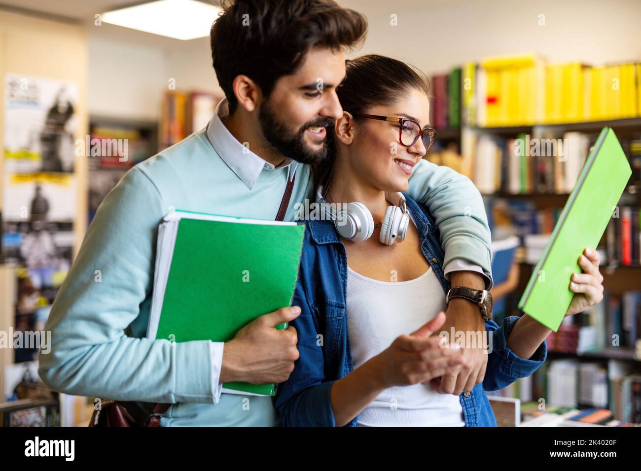 Group of happy college students studying in the school library. Education people university concept Stock Photo