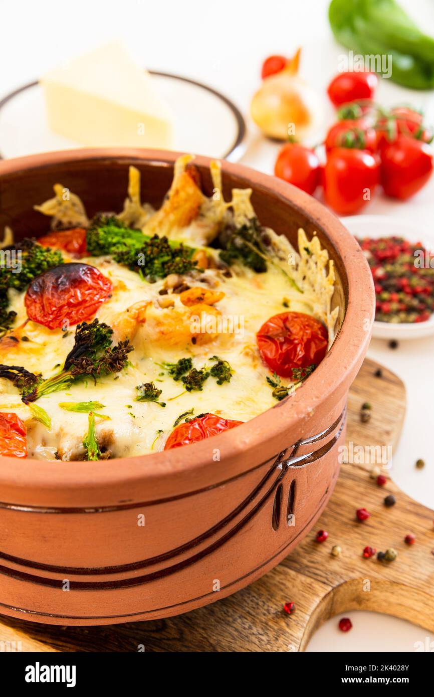 Penne pasta baked with tomatoes and mozzarella cheese Stock Photo Alamy