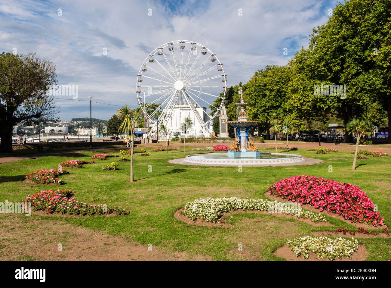 Fountain in Princess Gardens and English Riviera wheel on seafront in summer. Torquay, Devon, England, UK, Britain Stock Photo