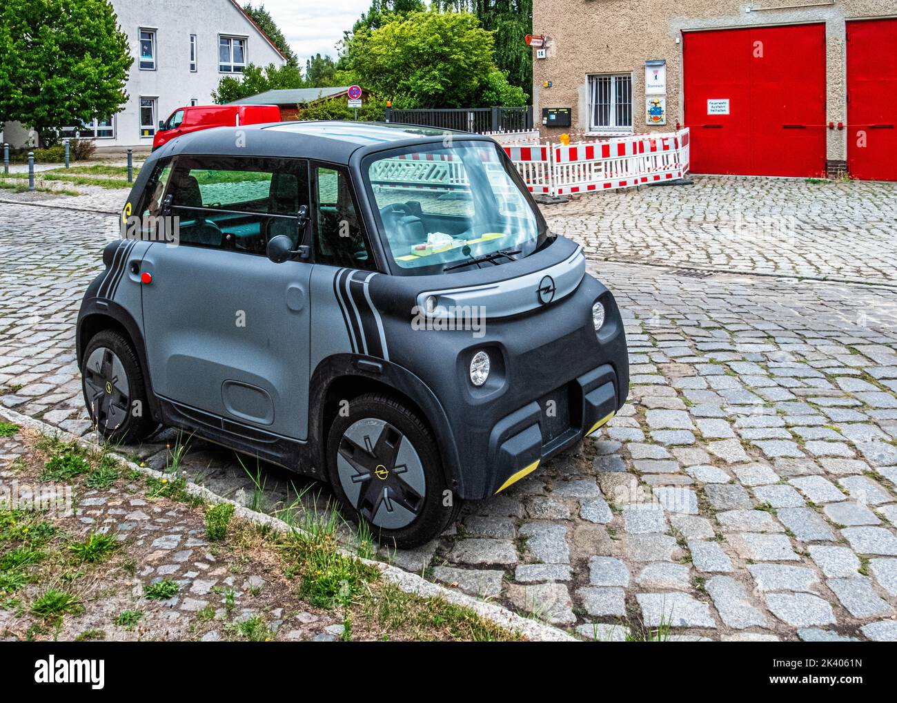 Small electric car parked outside Volunteer Fire Station,Hauptstrasse