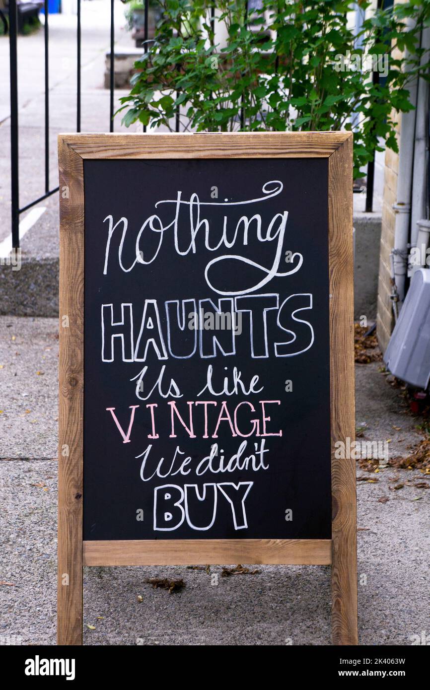A clever witty sign outside Damn Aged Vintage saying 'Nothing haunts like the vintage we didn't buy.' In Cold Spring, Westchester, New york. Stock Photo