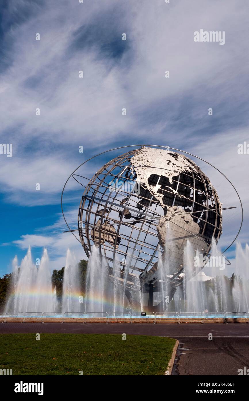 A visible rainbow seen in the fountains surrounding the Unisphere in Flushing Meadows Corona Park in Queens, New York City. Stock Photo