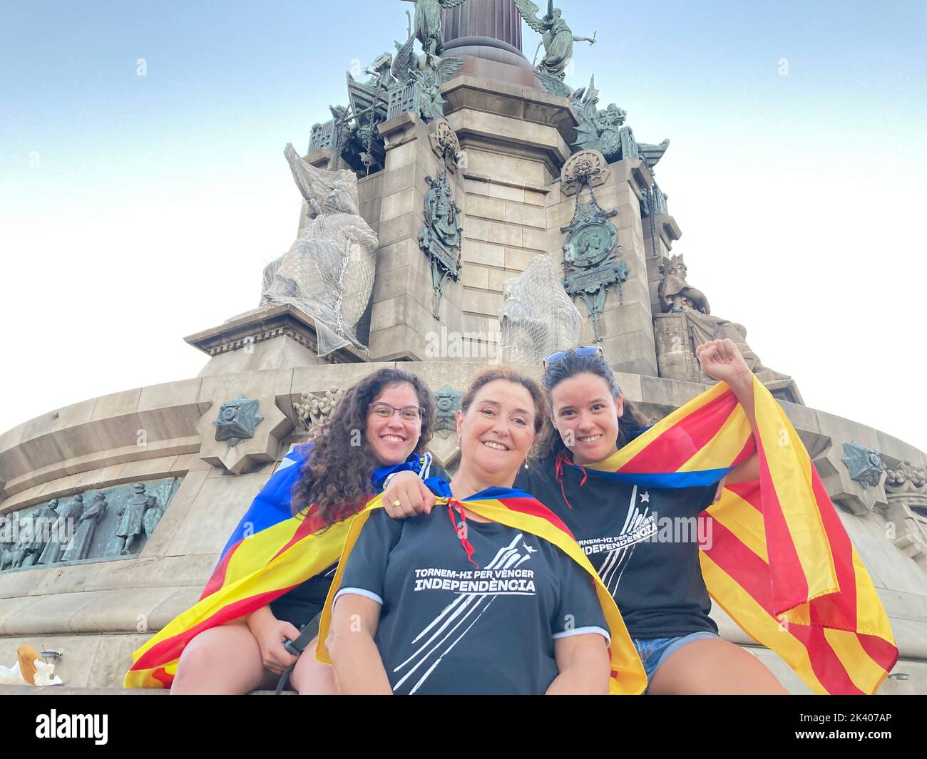 Barcelona, Spain. 11th Sep, 2022. Laura and her two daughters carry the Catalan flag. Five years after the Catalan independence referendum, the euphoria has now faded. The separatists are divided. (to dpa 'Much frustration five years after Catalonia's chaos referendum') Credit: Emilio Rappold/dpa/Alamy Live News Stock Photo