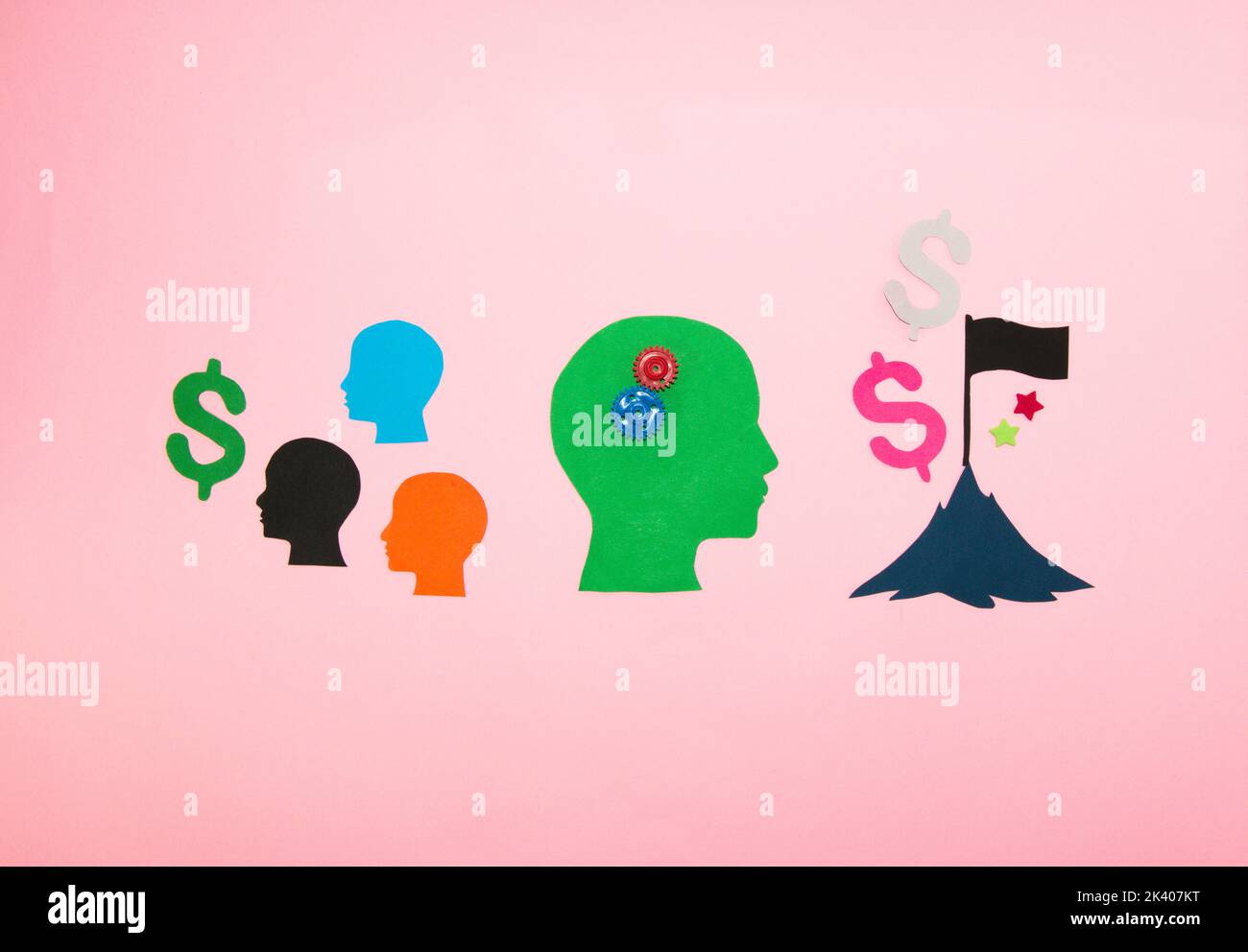 paper people head look towards money, a business person who thinks looks towards his goals, when he reaches the top of the business mountain it brings Stock Photo
