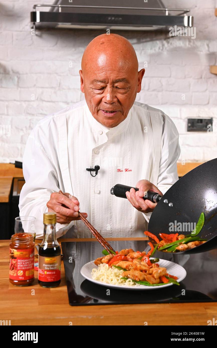 EDITORIAL USE ONLY Ken Hom cooks 'Ken's Pork with Chu Hou Sauce' from the  new 'Wok From Hom' recipe series, a collaboration with Lee Kum Kee aiming  to offer healthier, more affordable
