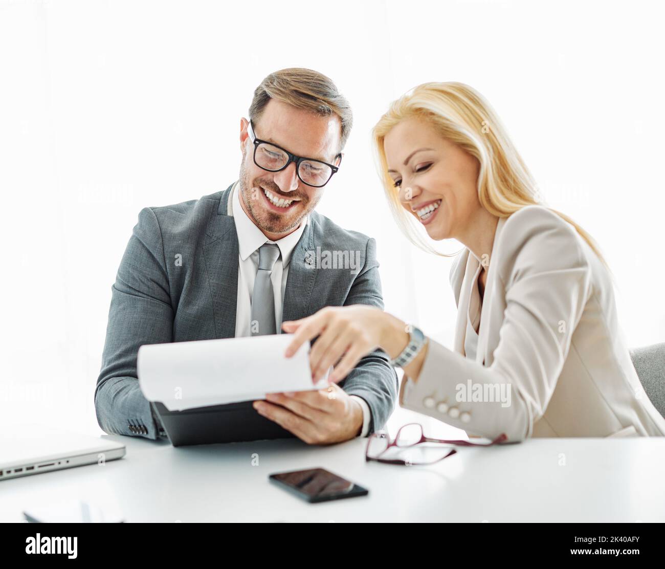 young business people meeting office teamwork paperwork document cotract success corporate discussion Stock Photo
