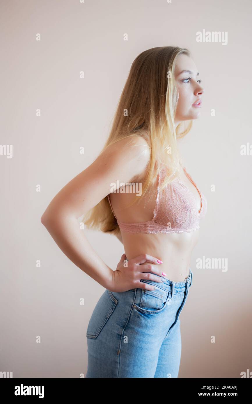 Portrait of beautiful young woman in bra. Studio shot. Stock Photo