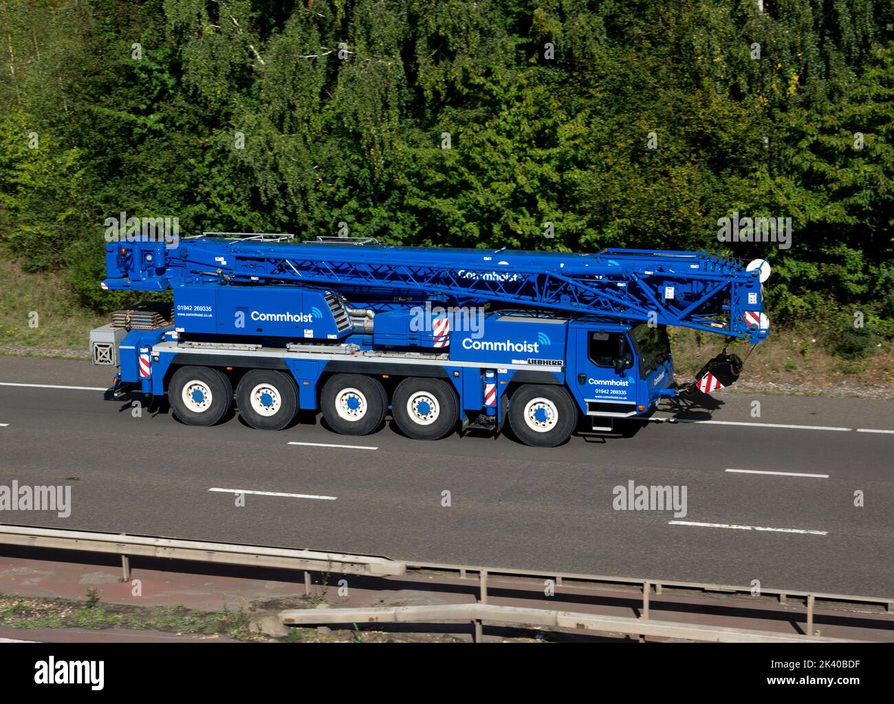 Commhoist lorry on the M40 motorway, Warwickshire, UK Stock Photo