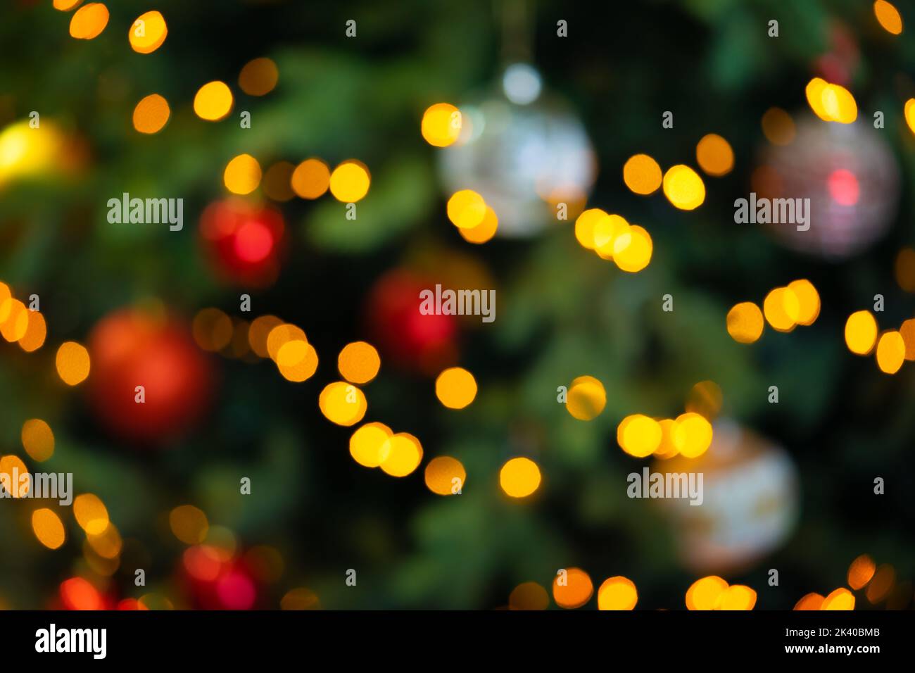 Blurred Christmas tree lights. Abstract background. Stock Photo