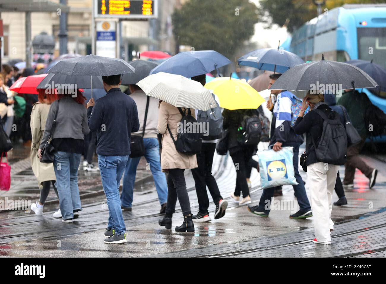 People are seen going to work on a rainy morning and running errands around town. The rain that has been falling in Zagreb since tonight, although not nearly as much as in Rijeka, is creating big crowds and problems, in Zagreb, Croatia, on September 29, 2022.   Photo: Patrik Macek/PIXSELL Stock Photo