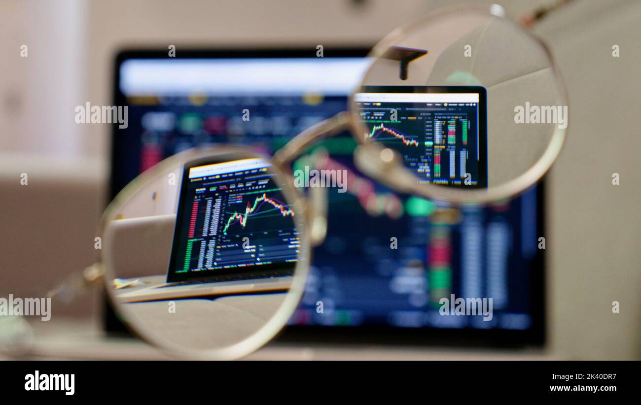 Laptop buy bitcoin on the Binance crypto exchange in glasses. Trading