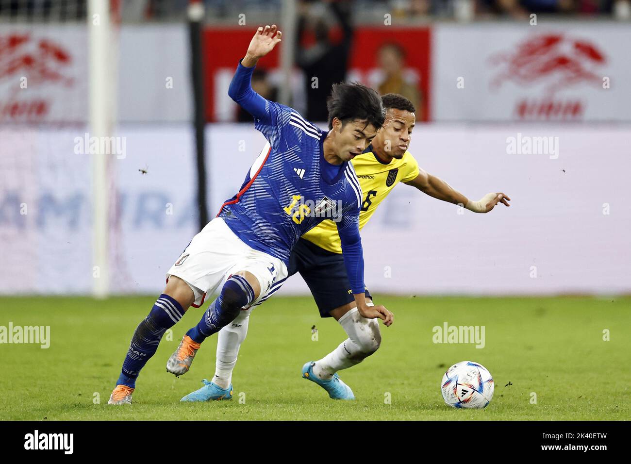 DUSSELDORF - (LR) Kaoru Mitoma of Japan, Byron Castillo of Ecuador ...