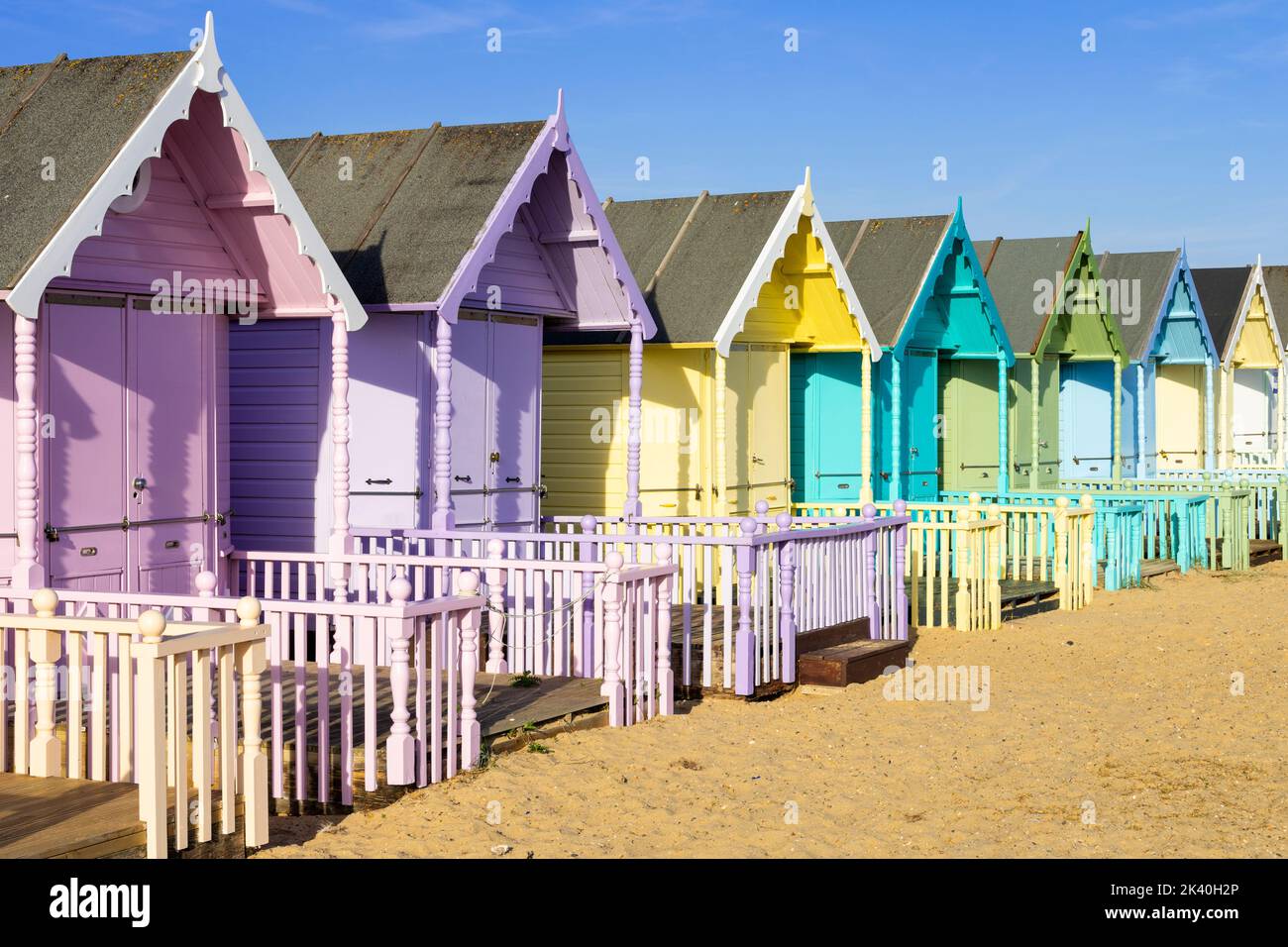 Mersea Island beach huts row of colourful beach huts Mersea Island