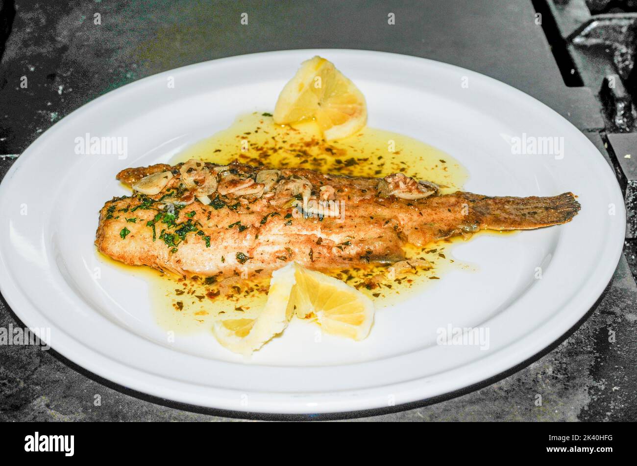 Sole meuniere with parsley and lemon Stock Photo
