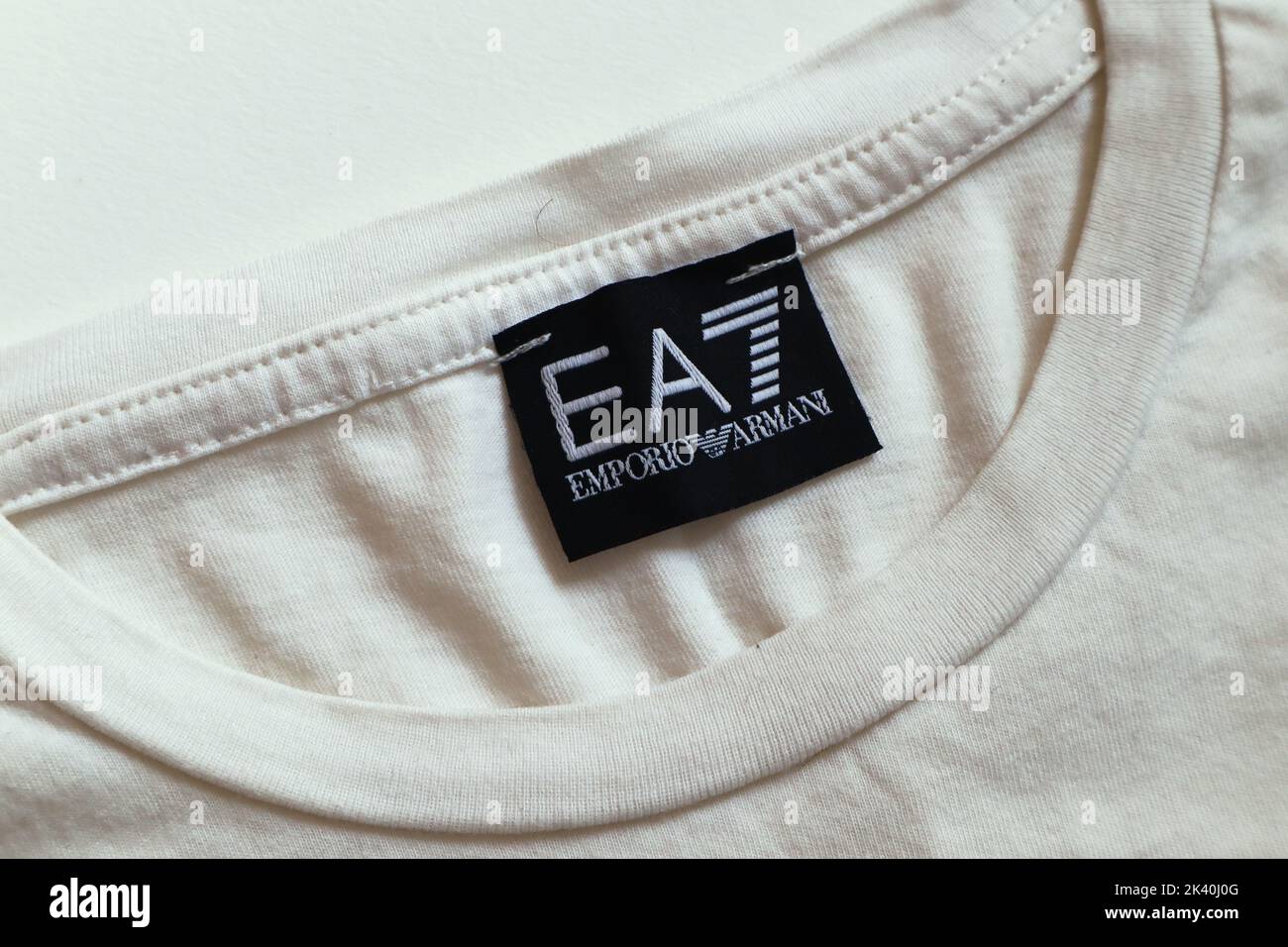 Label of an EA7 EMPORIO ARMANI t-shirt. EA7 is an Italian luxury fashion  house brand of GIORGIO ARMANI S.p.A. - Italy Stock Photo - Alamy