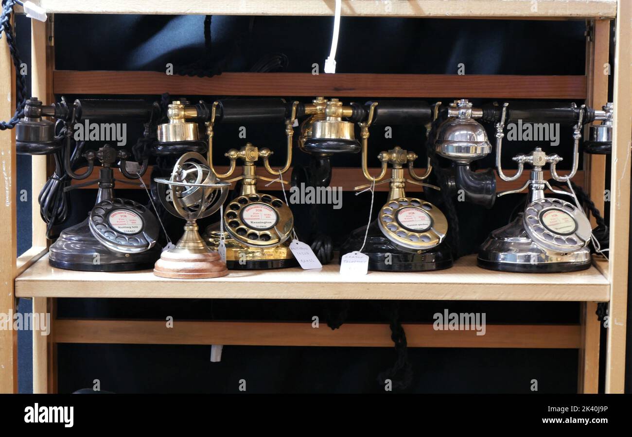 Old style telephones for sale in Covent Garden, London Stock Photo