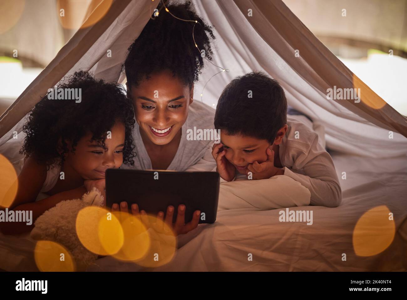 Family, tablet and online streaming with kids for a bedtime story(08)