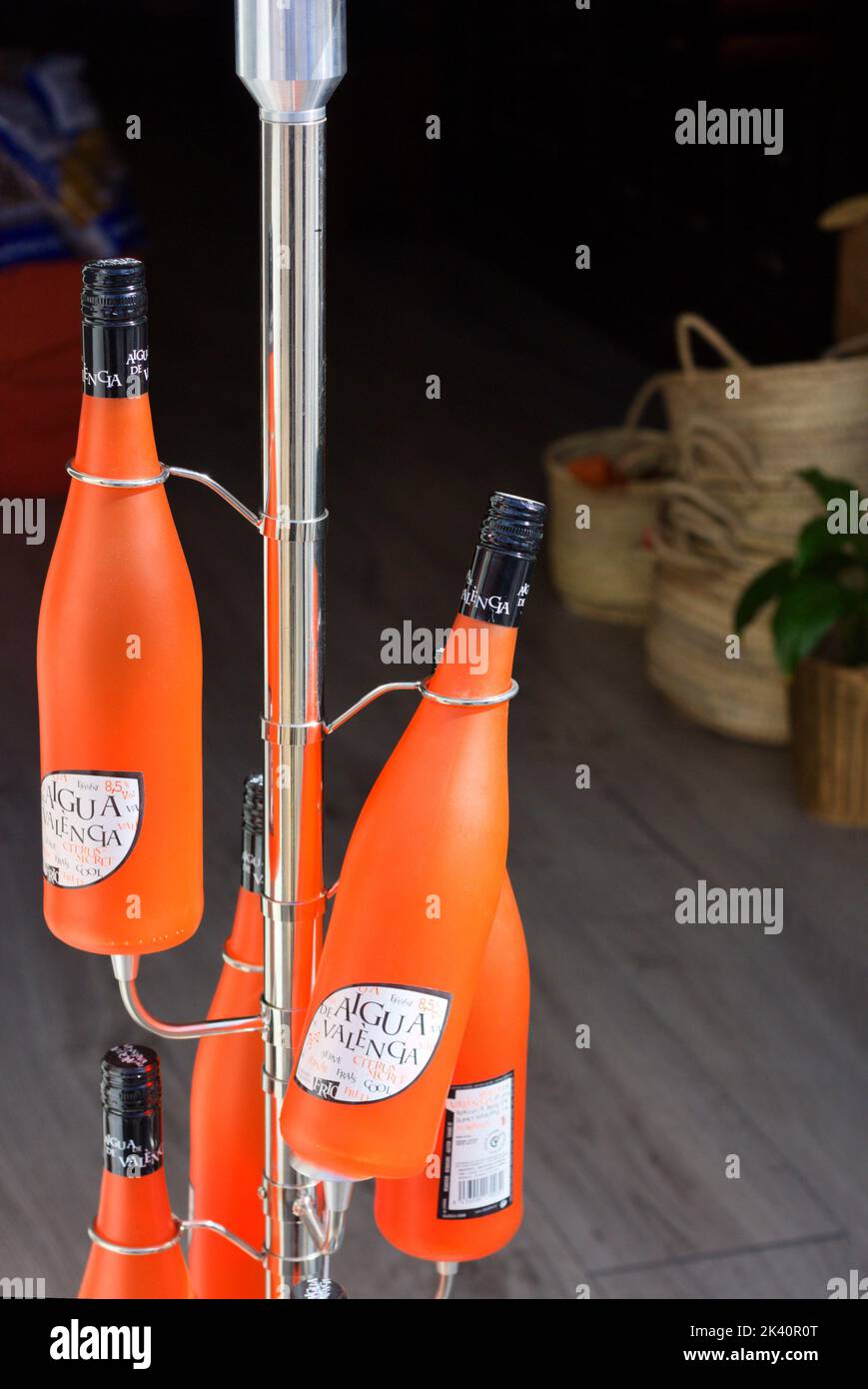 Valencia, Spain. Stand of bottles of Agua de Valencia, a typical alcoholic drink made with orange and cava, in a stand of a tourist souvenir shop in V Stock Photo