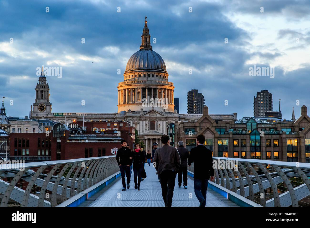LONDON, GREAT BRITAIN - MAY 11, 2014: It is a view of St. Paul's Cathedral from the Millennium Bridge on a cloudy spring evening. Stock Photo