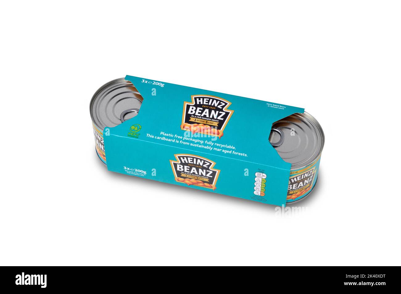 Heinz pack of three small tins of baked beans isolated on white cut out Stock Photo