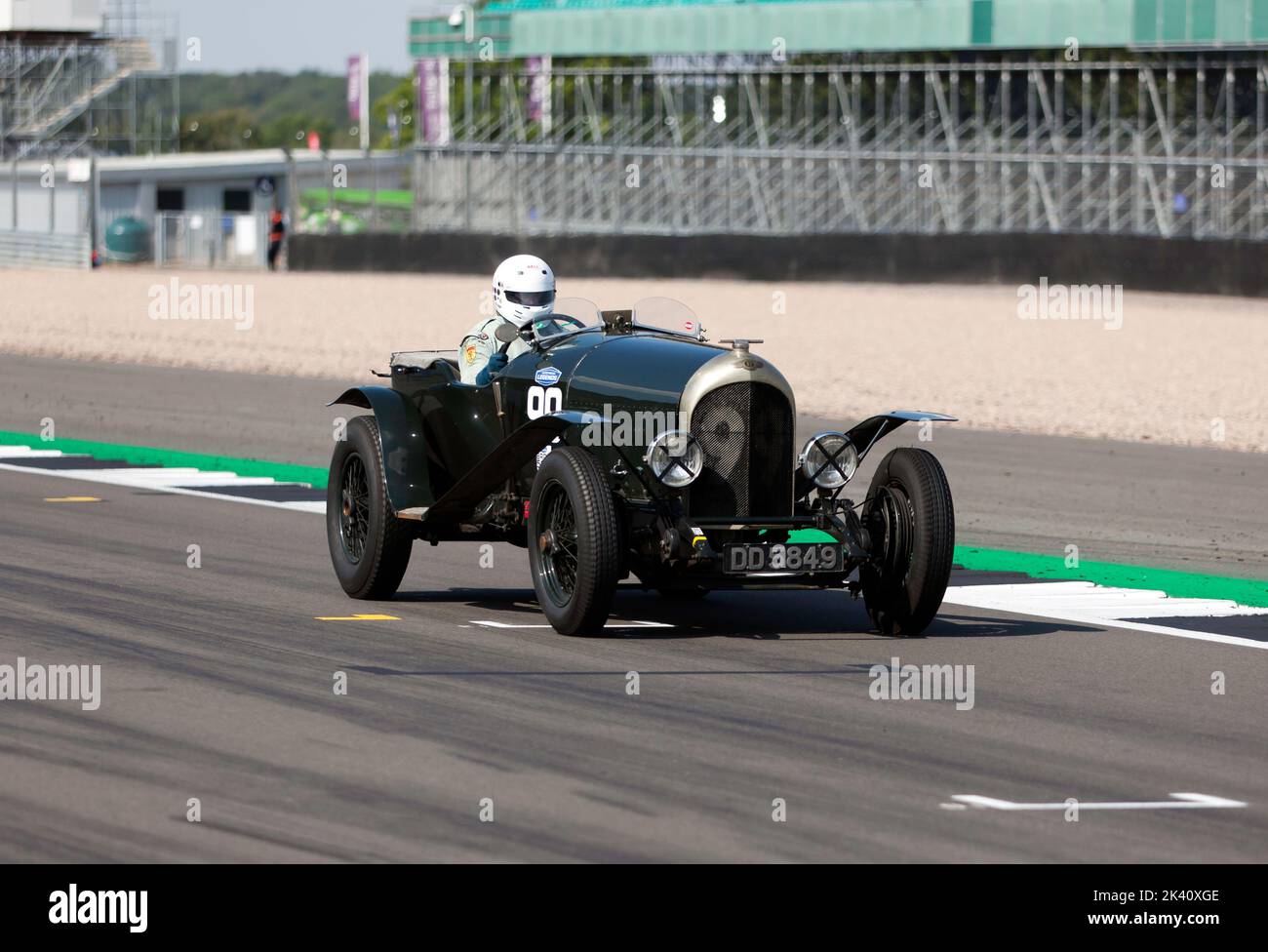 Ewen Getley, driving his Green, 1924,Bentley 3/4½, during the MRL Pre-War Sports Cars 'BRDC 500' Race at  the 2022 Silverstone Classic. Stock Photo