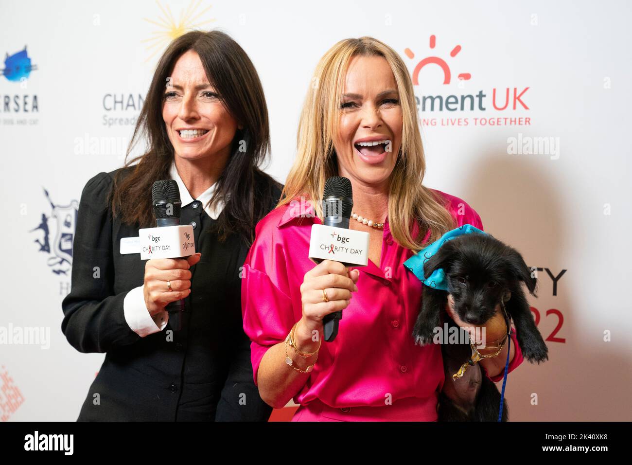 Davina McCall and Amanda Holden during the BGC annual charity day at Canary Wharf in London, in commemoration of BGC's 658 colleagues and the 61 Eurobrokers employees lost on 9/11. Over the past 18 years, approximately 192 million US Dollars has been raised as a direct result of the charity day. Picture date: Thursday September 29, 2022. Stock Photo