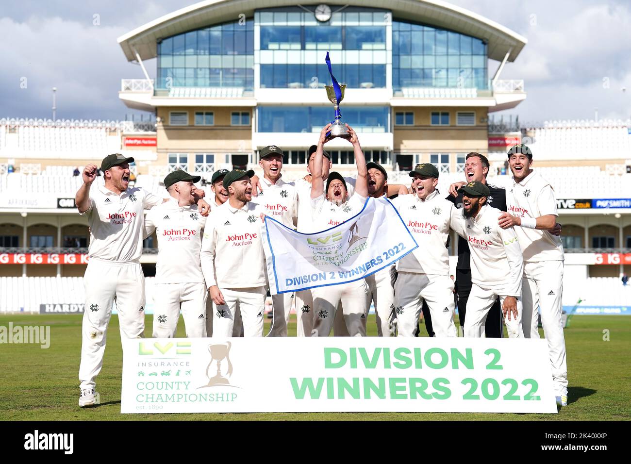 Nottinghamshire's Steven Mullaney (centre) celebrates with the trophy with team-mates after winning the LV= Insurance County Championship, Division two following their victory against Durham at Trent Bridge, Nottingham. Picture date: Thursday September 29, 2022. Stock Photo