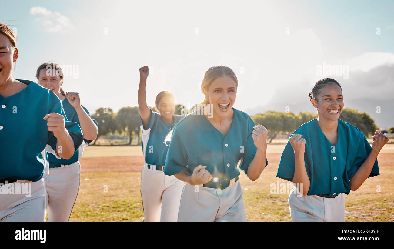 Happy, baseball women team and winner with success fitness team, winning and celebration together after sports game. Teamwork, smile and softball Stock Photo