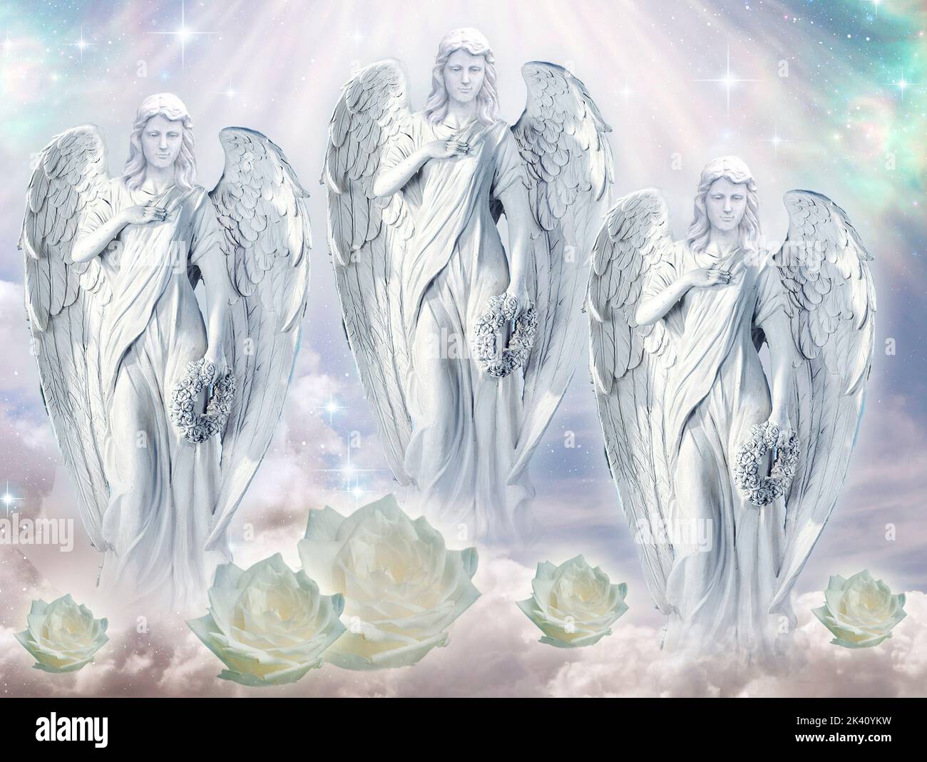 two angels archangels with divine rays of light like spiritual and religious concept Stock Photo