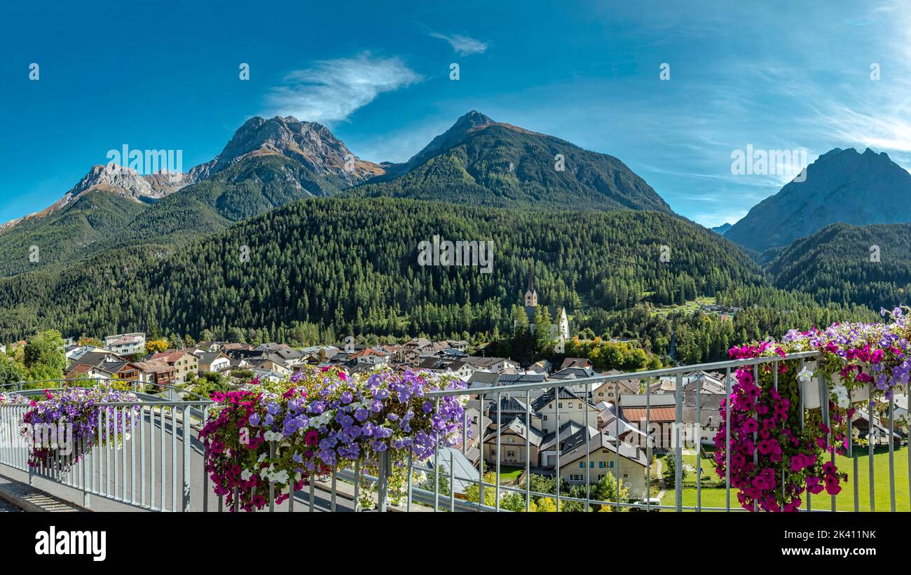View at the lower city and the mountain Piz Lischana *** Local Caption ***  Scuol,  Graubünden, Switzerland, city, village, flowers, autumn, mountains Stock Photo