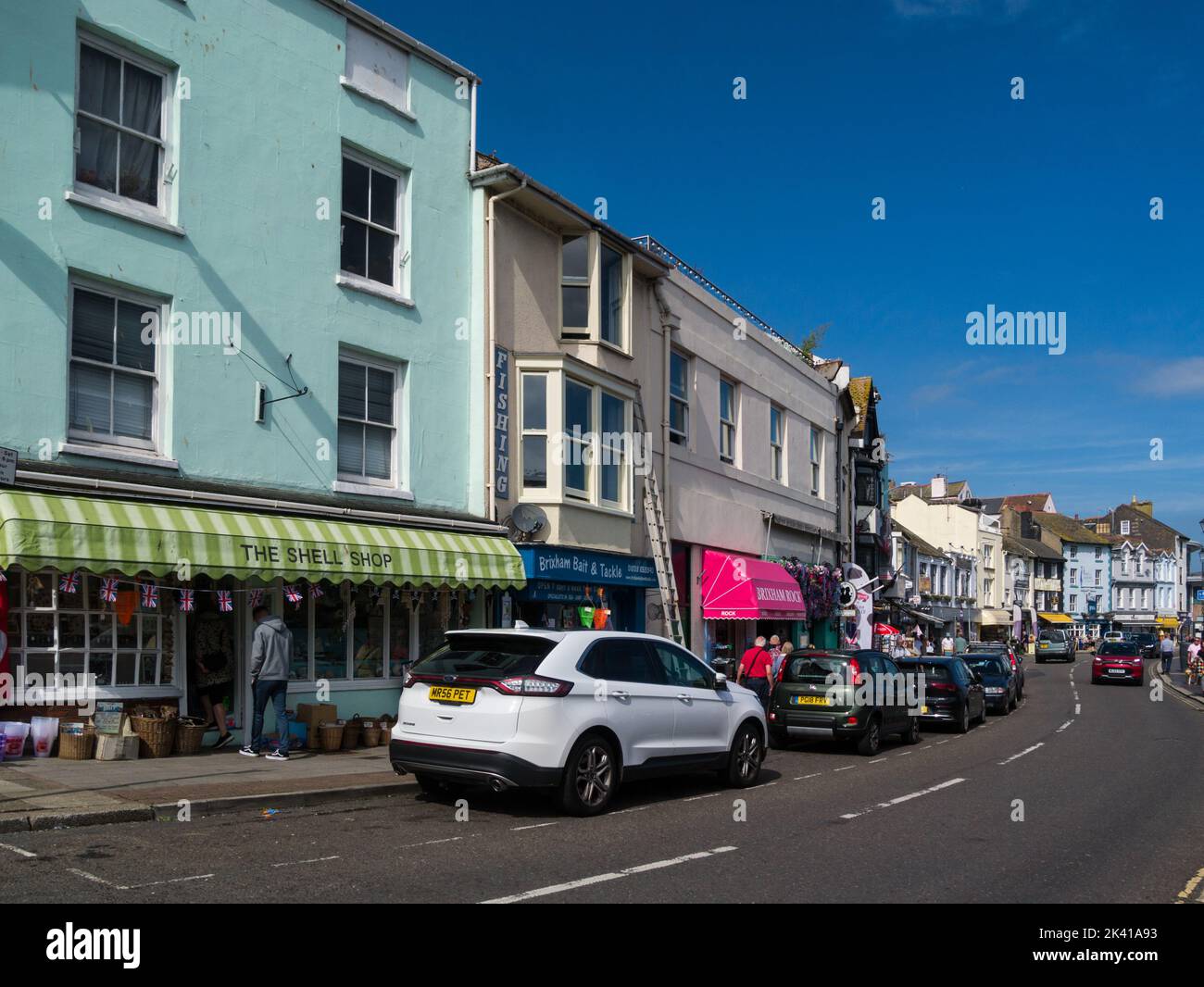 Brixham devon england uk harbourside tourist shops and hotels hires