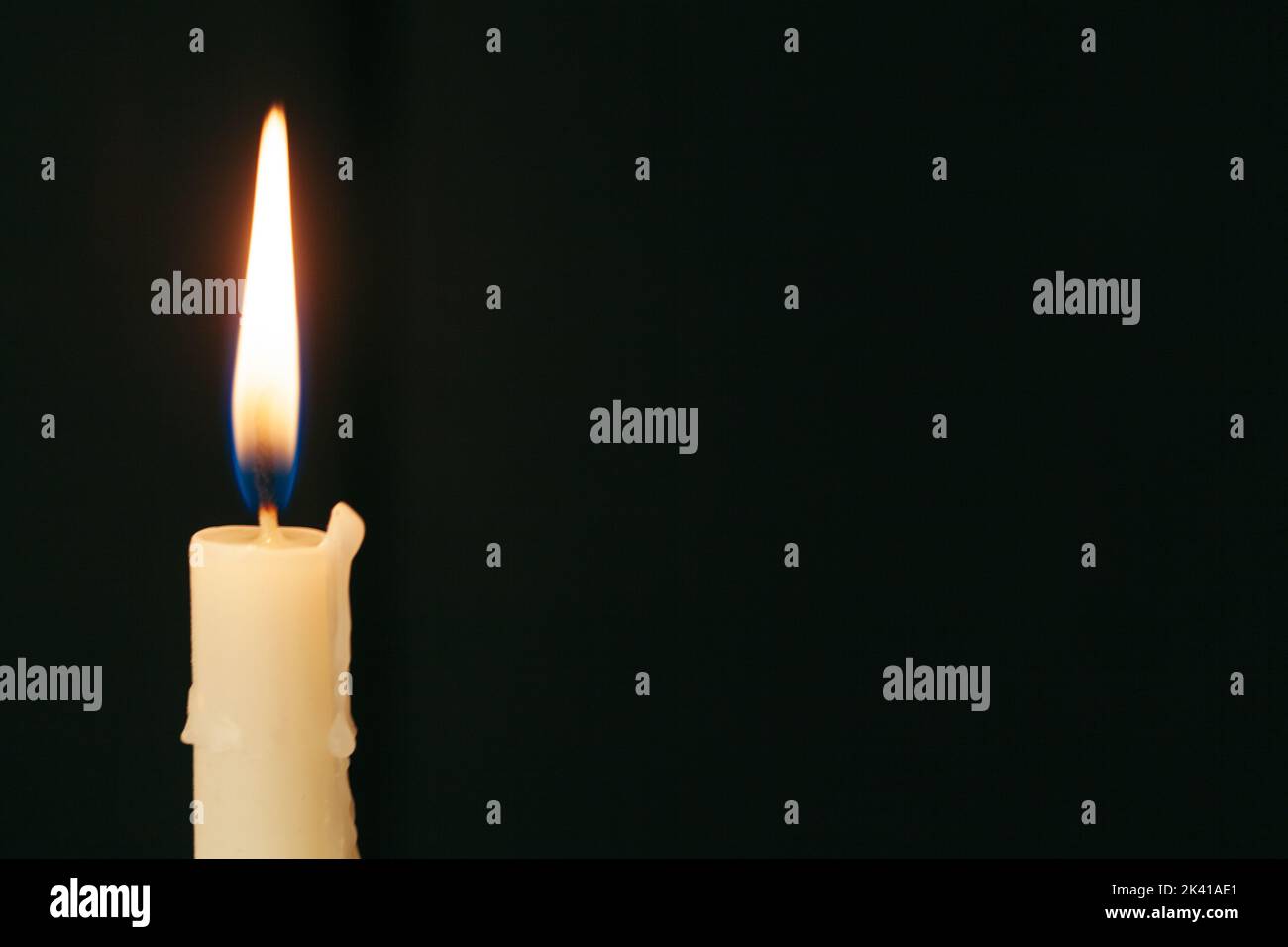 Candle flame close up on a black background Stock Photo - Alamy