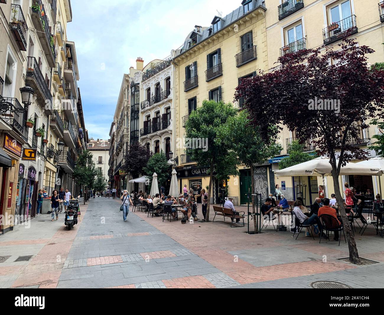Spain, Madrid. Sidewalk Cafe, Calle de las Huertas. Stock Photo