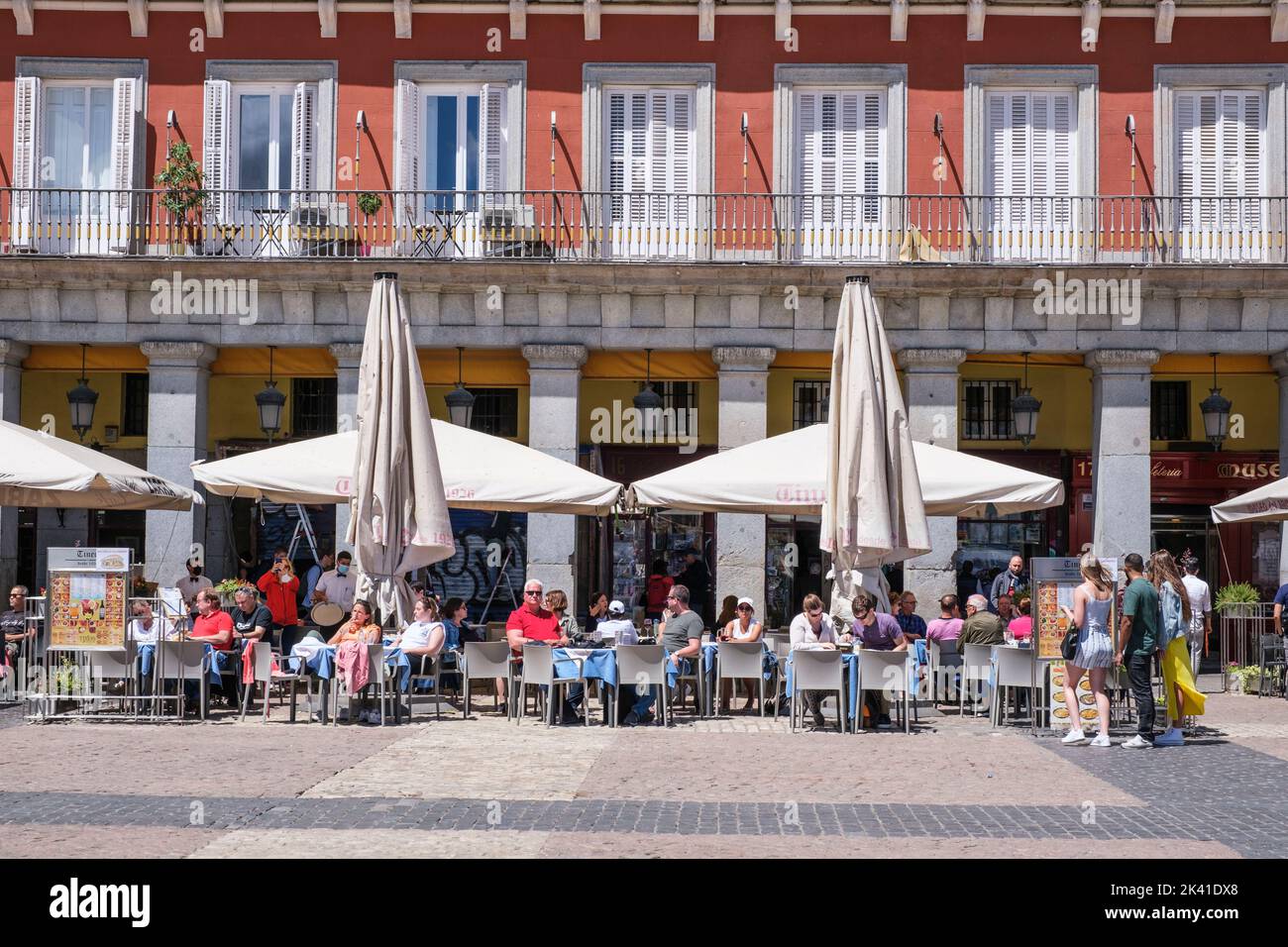 Spain, Madrid. Outdoor Restaurant in the Plaza Mayor. Stock Photo