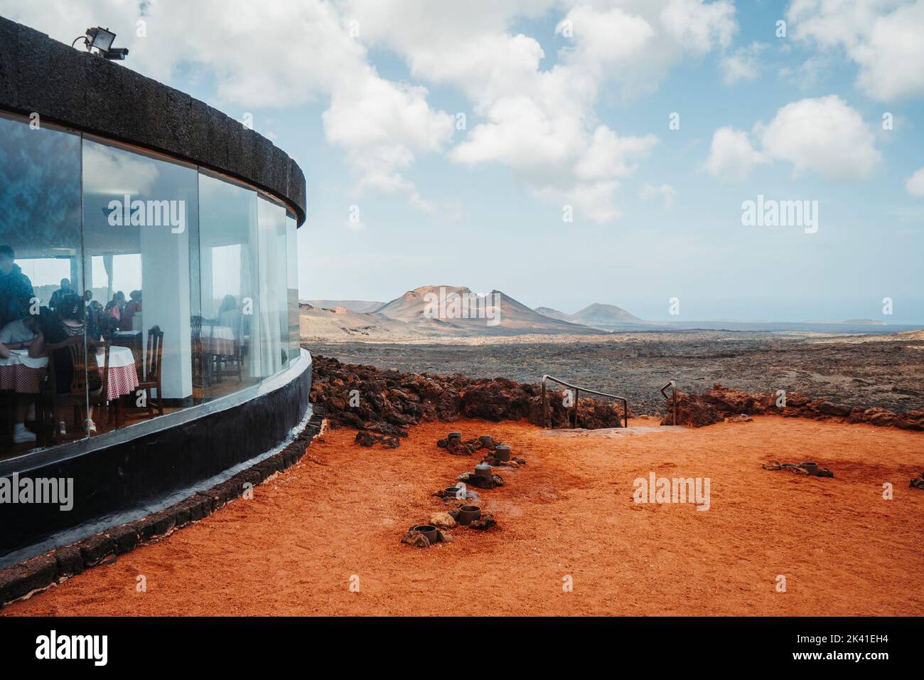 Panoramic view from visitor center with holes in the ground and restaurant, Timanfaya National Park, Canary Islands, Spain Stock Photo