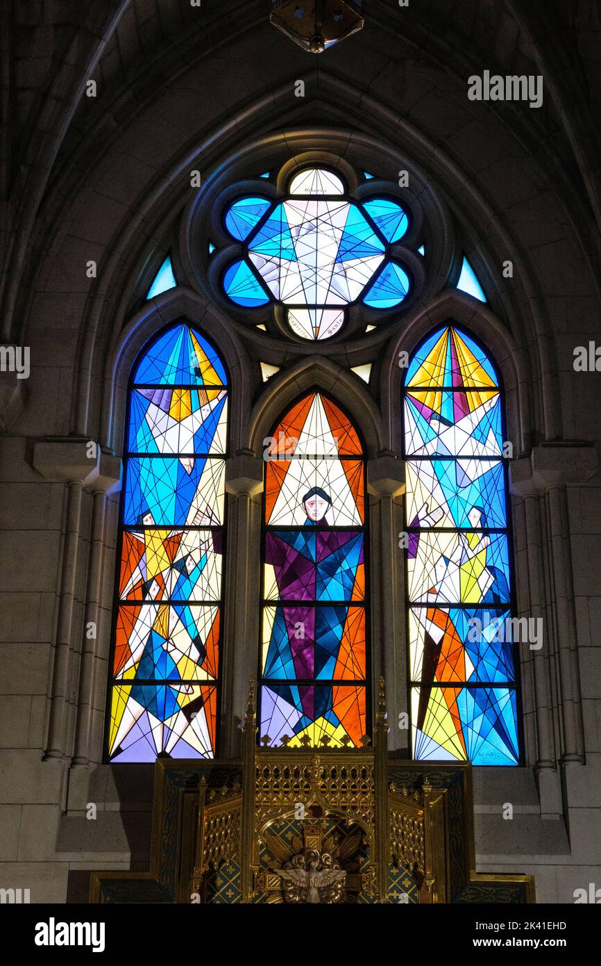 Spain, Madrid. Cathedral of Almudena. Modern Stained-glass Window in Side Chapel. Stock Photo
