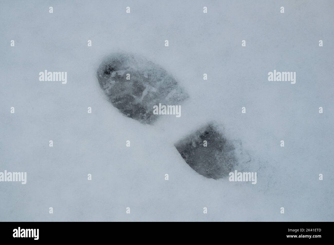 Footprints in the snow Stock Photo Alamy
