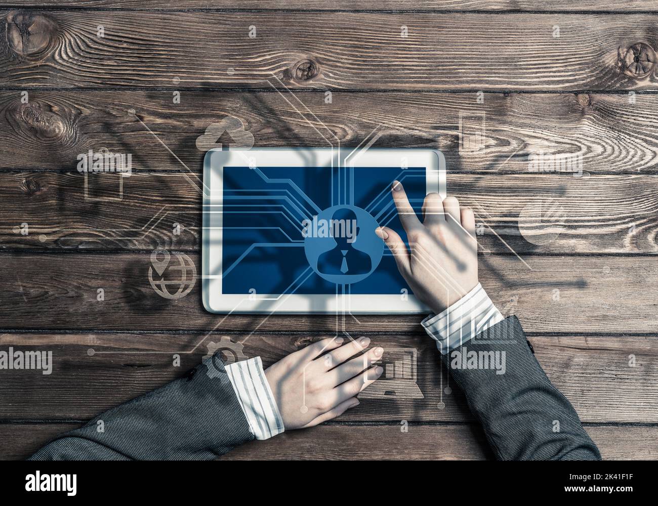 Business workplace with tablet device in female hands and media user interface Stock Photo