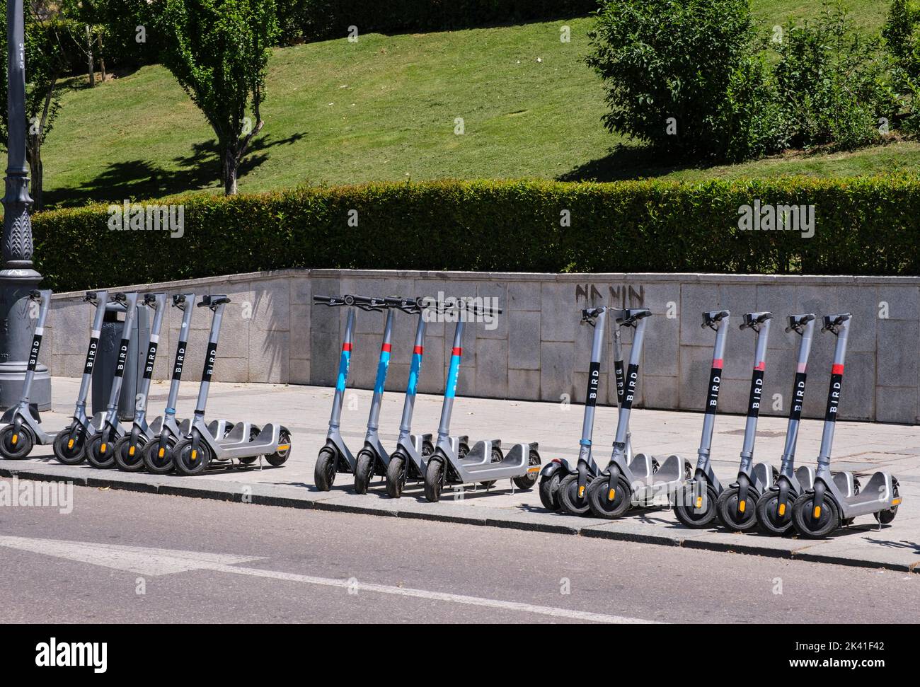 Spain, Madrid. Motorized Scooters for Rent. Stock Photo