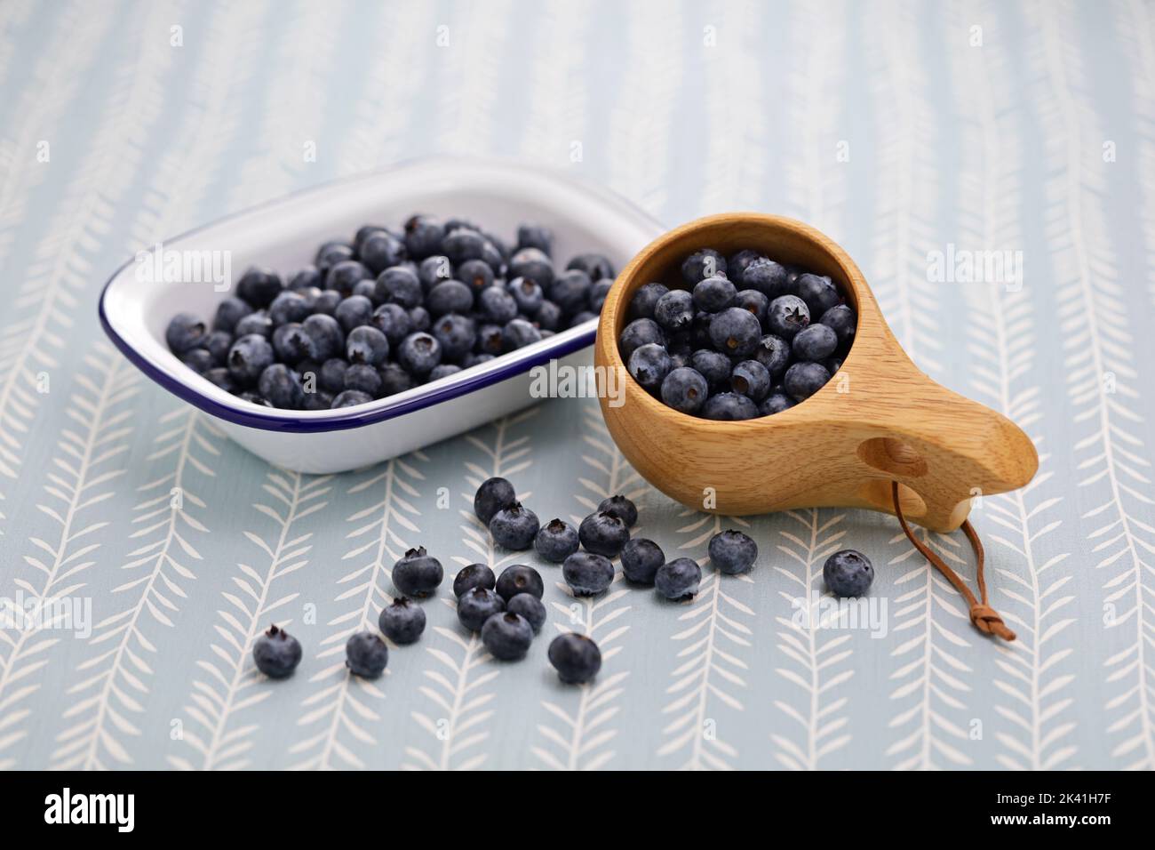 Kuksa(Finnish wooden mug) and fresh blueberries Stock Photo