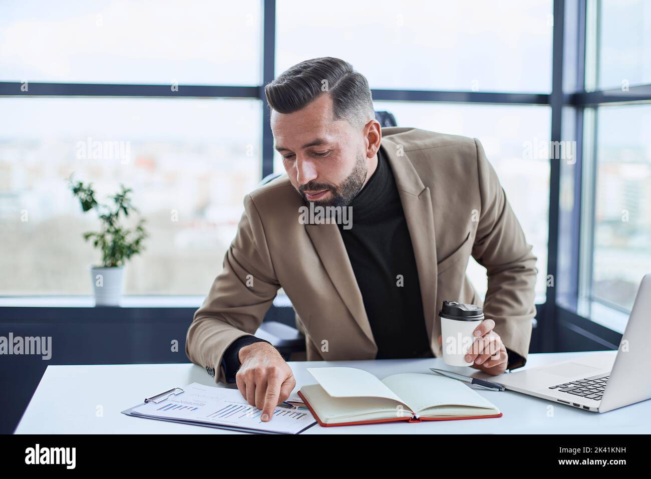 businessman analyzing a financial document. close up. Stock Photo