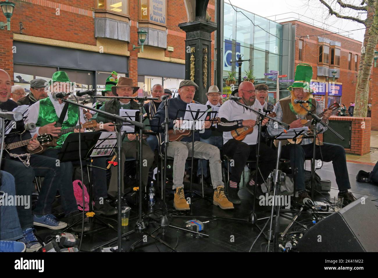 The Gathering, perform in Golden Square, Warrington, Cheshire, England, UK, for St Patricks Day, March 2019 Stock Photo