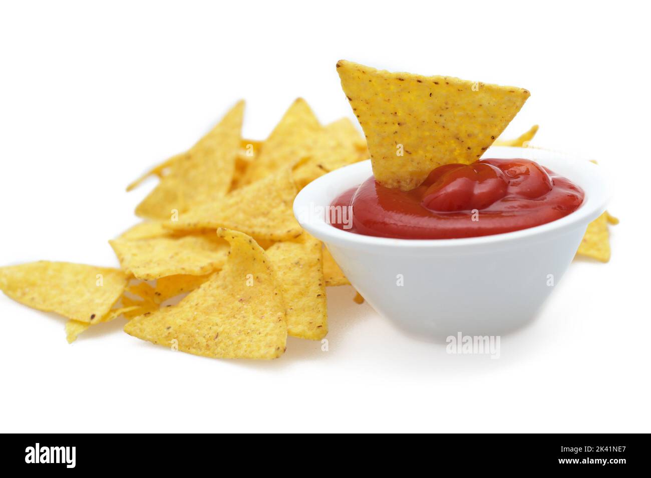 Bowl of salsa with tortilla chips on white background Stock Photo Alamy